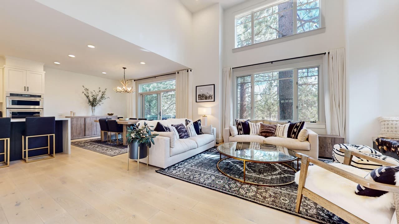 Luxury vacation rental living space with timber and mountain views